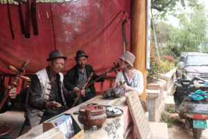 Playing music together with a local BaiSha music group, Manu can do the "ting"